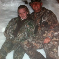 Alissa and Dad taking some time off from hunting hanging in the snow